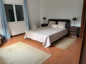 Casa dos Plátanos quarto branco